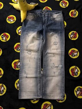 Buckle Men’s Distressed Light Blue Bootcut Jeans
